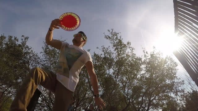 A man in position to throw a disc at Joe Eakes Disc Golf Course in Wilmington, NC