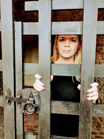 visitor in "jail" at Burgwin-Wright House