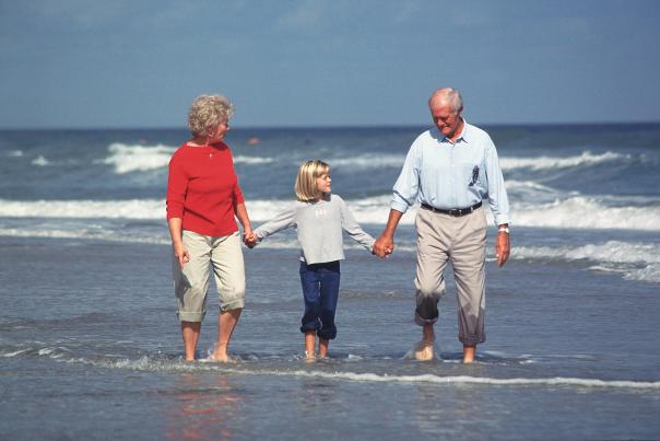 Grandparents with granddaughter at Wilmington, NC Beach